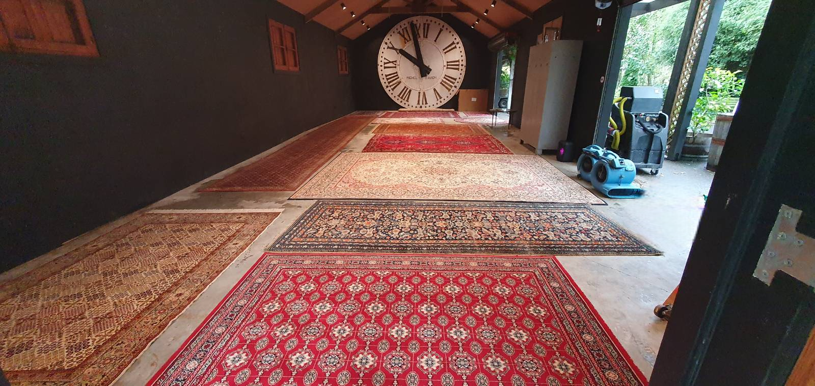 Area rugs laid out for specialist rug cleaning